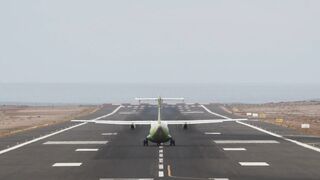 Aircraft Taking Off From Runway By The Ocean