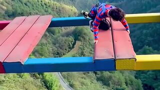 Don't Look Down! Terrifying Cliff Bridge Challenge
