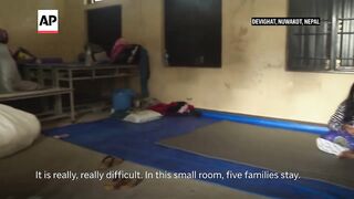 Families displaced by Nepal floods seek shelter and supplies at relief centers