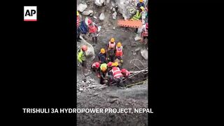 2 trapped workers pulled out alive from a tunnel 9 days after Nepal floods