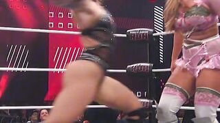 A mid-air collision between the two wrestlers