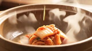 Kimchi jjigae (Korea🇰🇷) — "Fiery, fermented, deeply savory 🌶️"