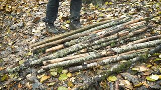 Building complete and warm survival shelter | Bushcraft earth hut, grass roof & fireplace with clay 2