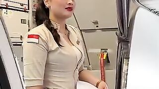 Beautiful flight attendants, preparing for the boarding announcement.mp4