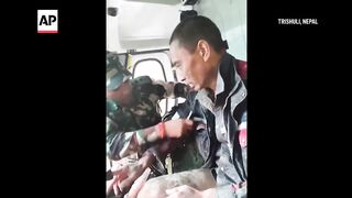 Rescuers in Nepal pull Chinese man and woman alive from debris 10 days after floods