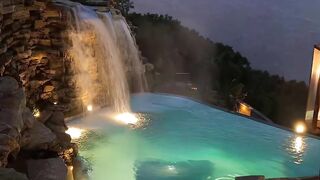 somewhere in the ozarks the pool has its own waterfall