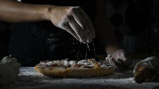 PREPARING PIZZA