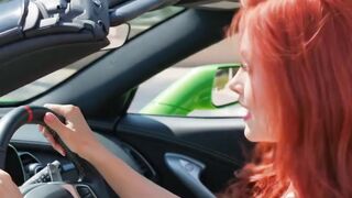 Woman in a sports car