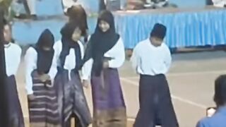 Traditional Indonesian Dance Performance at Night