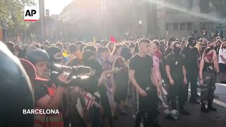 Protesters clash with police in Barcelona during the region’s national day