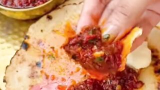 Spice up your mealtime with this fiery and flavorful garlic chutney recipe! Perfect with hot rotis and a dollop of butter.