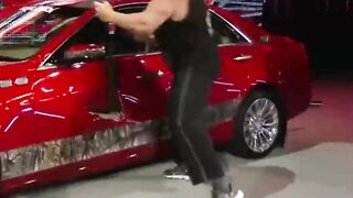 Brock Lesnar destroys J&J Security's prized Cadillac