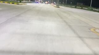 Night Drive on a Brightly Lit Highway