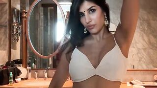 Jasmin Walia looking so hot super sexy in white dress showing her boobs and nipples and back side watch now.