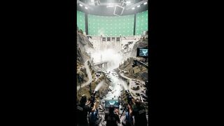 Filmmaking Dam Bursts Across Miniature Valley 111