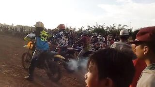 "Local motocross race vibes! The energy here is unreal. 🏁🔥"