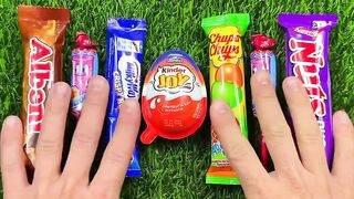 Colorful rainbow lollipop candy / unpacking Chocolate eat..