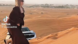 Playing of Woman on Sand