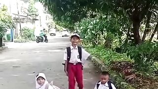 Elementary School Student with a Disability Enthusiastic About School