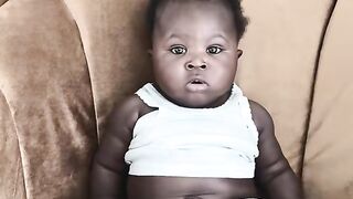 Baby watching me eating