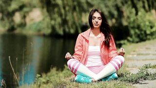 Peaceful Female Meditation Practice by the Lake