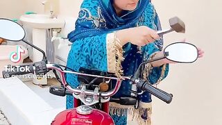 Girl bike reparing