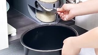 Rice container with measuring spoon
