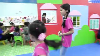 Kids doctor pretend play and healthcare for family at indoor playground