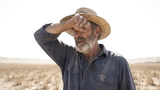 Farmer tending crops in the valley,
