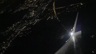 Night sky view from the top of the plane