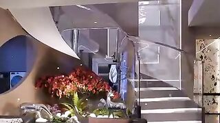 The sweeping spiral glass staircase home
