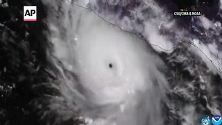 Residents clear debris after Hurricane Polo hits Mexico