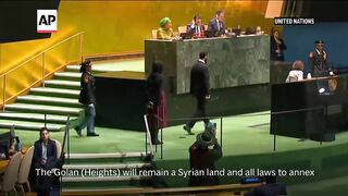 Syria leader lashes out at Israel and says the Golan Heights 'will remain Syrian land'