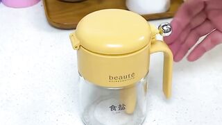 Push button airtight container with spoon