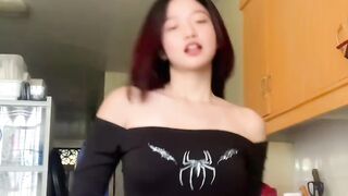 Stylish Dance Moves in a Casual Indoor Setting