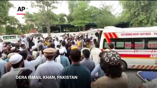 Injured brought to hospital in Pakistan after suicide bombing at checkpoint kills 12