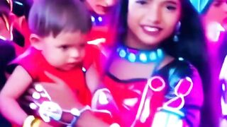 girls dance with baby boy