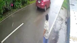 What Just Happened on This Rainy Road? Caught on CCTV!