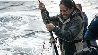 Fishing in the open sea amidst big waves