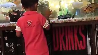 ছেলে আমার রঙিন মাছ দেখে ফিদা.