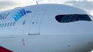 Garuda Indonesia Airbus A330-300 in special vintage retro livery taxiing on the apron of Soekarno Hatta International Airport