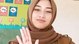 A beautiful, busty female teacher joins the viral TikTok dance trend.