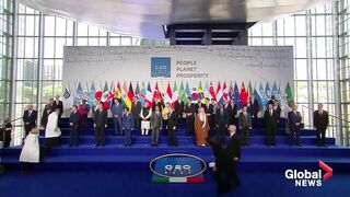G20 summit_ World leaders pose for “family photo” with first responders in Rome