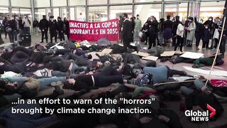 Halloween-themed climate protest held as COP26 president says climate lights _flashing red_