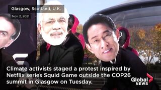 COP26_ Activists stage _Squid Game_-inspired protest for world leaders.