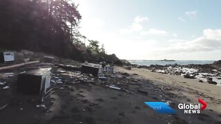 Cargo ship container clean-up crew finds refrigerators, Styrofoam and debris on BC beach