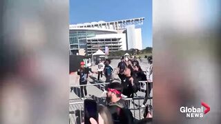 Astroworld concert crush_ Fans rush security prior to _mass casualty incident_ at Travis Scott show.
