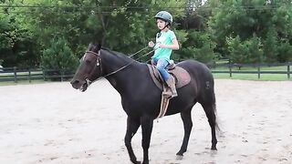 Maya_Rides_a_Horse(360p).