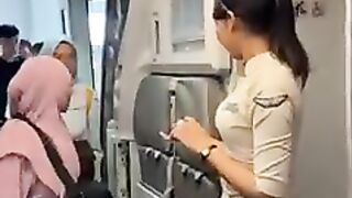 Super Air Jet flight attendant checking passenger tickets.mp4 3