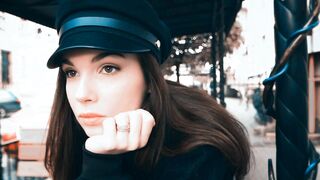 Glamorous Female Model Posing in Stylish Black Cap